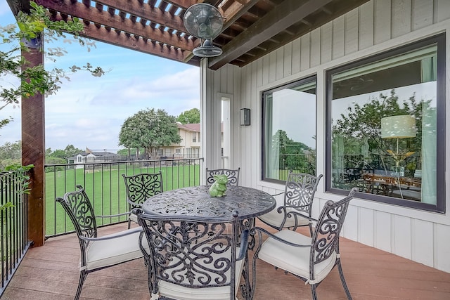 wooden balcony featuring a pergola and a deck