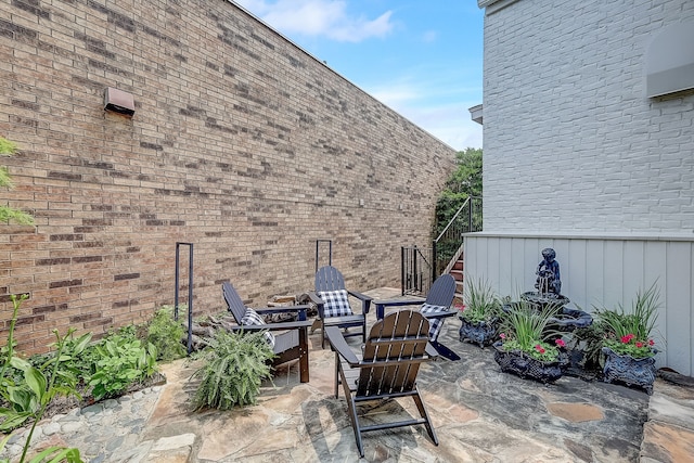 435 Columbia Dr, Rockwall, TX 75032 - view of exterior entry featuring a patio
