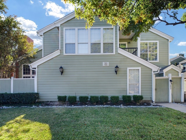 view of property exterior featuring a lawn