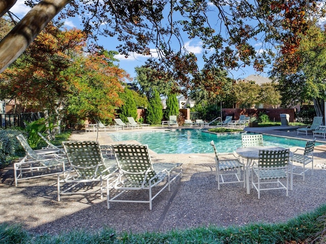 view of swimming pool featuring a patio