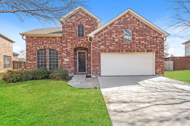 traditional-style home with an attached garage, a front yard, and brick siding