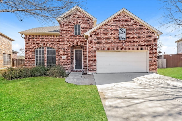 traditional-style house featuring an attached garage, fence, a front lawn, and brick siding