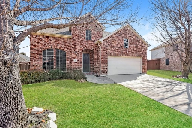 traditional home with brick siding, a shingled roof, concrete driveway, fence, and a front yard