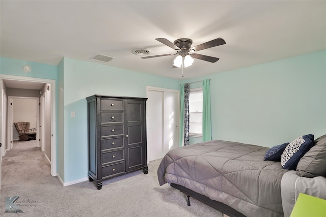 carpeted bedroom featuring ceiling fan