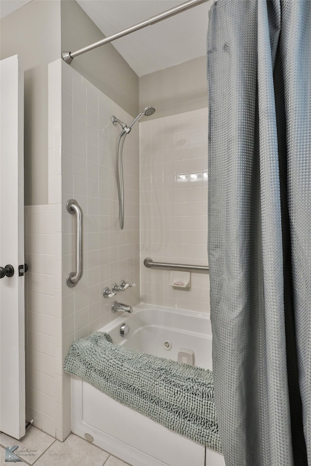 bathroom with tile patterned flooring and shower / bath combination with curtain