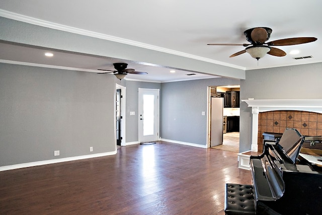 unfurnished living room featuring dark hardwood / wood-style floors and crown molding