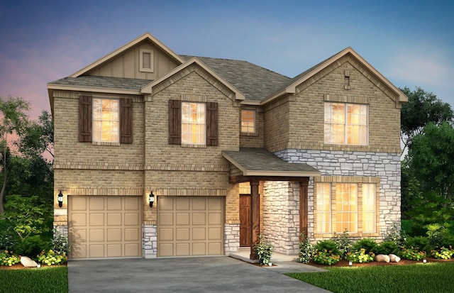 view of front of home with a garage