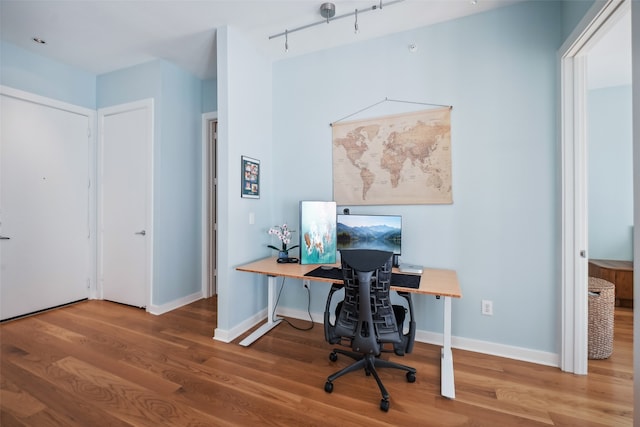 office space featuring wood-type flooring