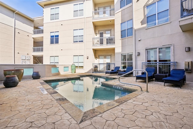 view of pool with a patio area