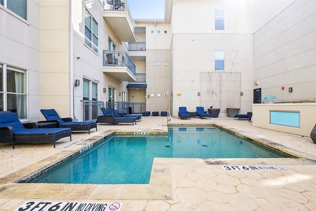 view of pool with a patio