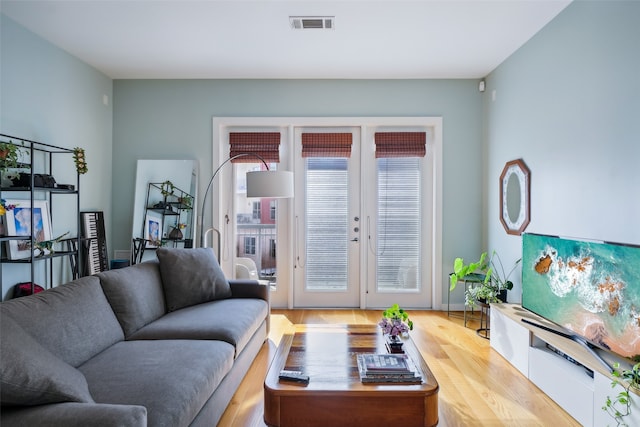 living room featuring light wood-type flooring