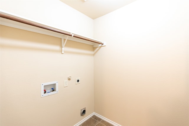 laundry room featuring hookup for a gas dryer, hookup for a washing machine, tile patterned flooring, and hookup for an electric dryer