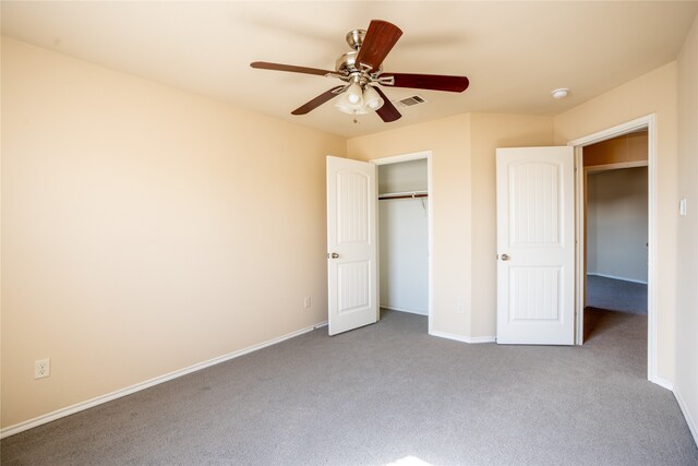 unfurnished bedroom with ceiling fan and light carpet