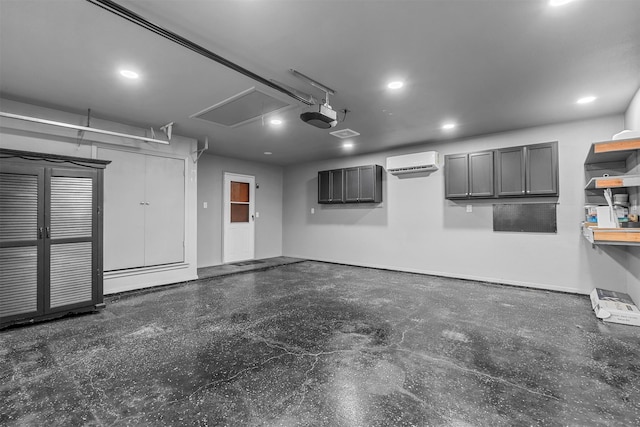 garage featuring a garage door opener and a wall unit AC