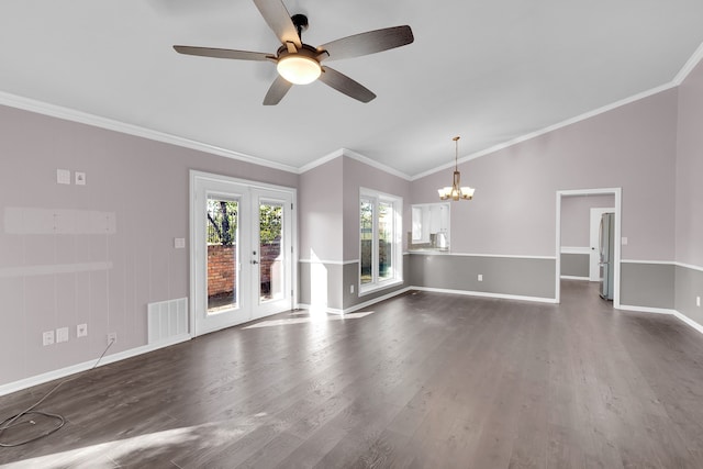 spare room with vaulted ceiling, crown molding, dark wood-type flooring, and french doors