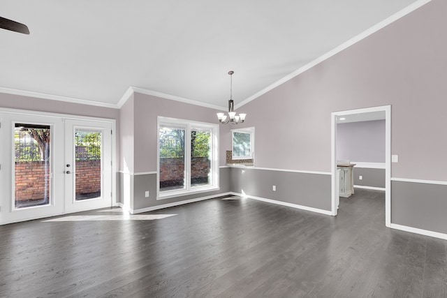 interior space with dark hardwood / wood-style flooring, a wealth of natural light, and crown molding