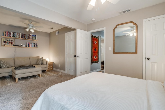 bedroom with ceiling fan and carpet floors