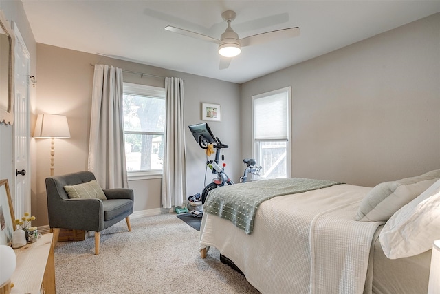 bedroom featuring ceiling fan and carpet floors