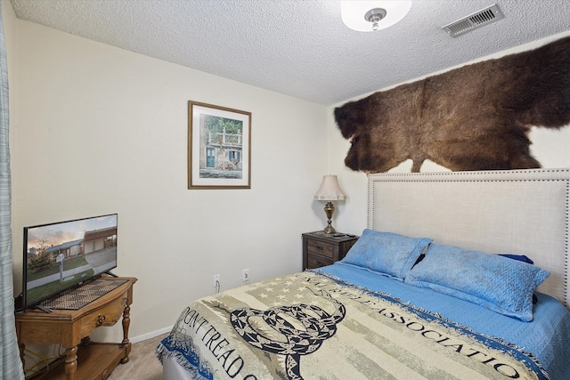 bedroom with a textured ceiling