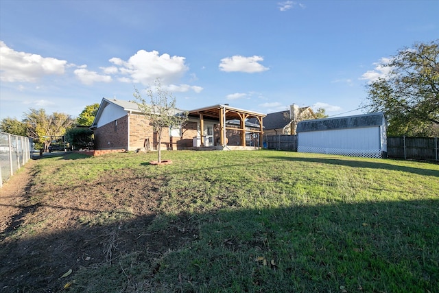 exterior space featuring a storage shed and a yard