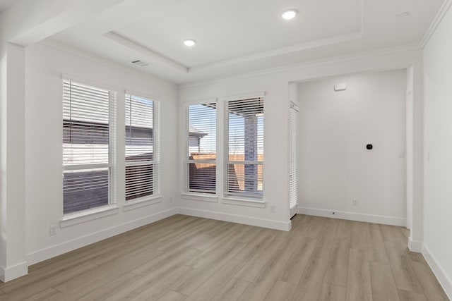 740 Wilderness Point Ln, Anna, TX 75409 - empty room with a tray ceiling, light wood-type flooring, crown molding, and recessed lighting