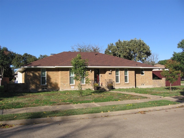 single story home featuring a front yard