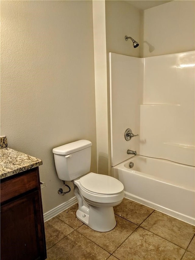 full bathroom with tile patterned flooring, vanity, bathing tub / shower combination, and toilet