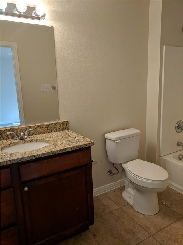 full bathroom with tile patterned flooring, vanity, toilet, and shower / washtub combination