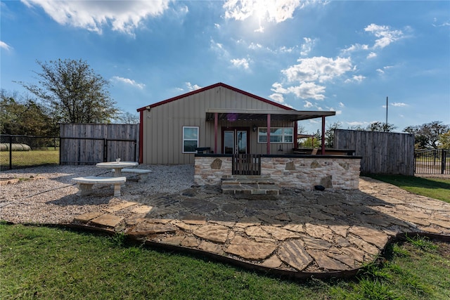 view of outbuilding with a porch