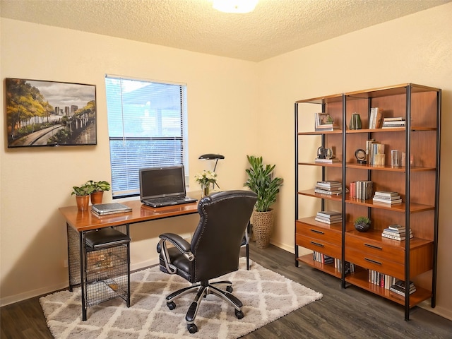 office space with a textured ceiling and dark hardwood / wood-style flooring