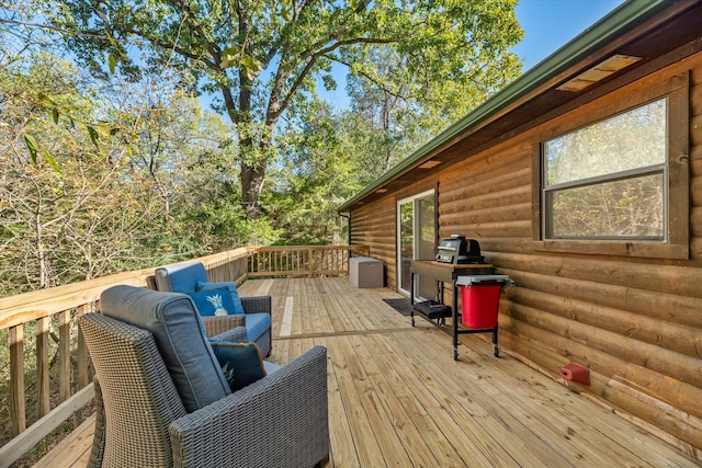 wooden deck featuring an outdoor hangout area