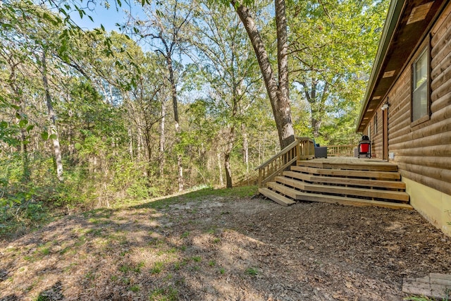 view of yard with a deck