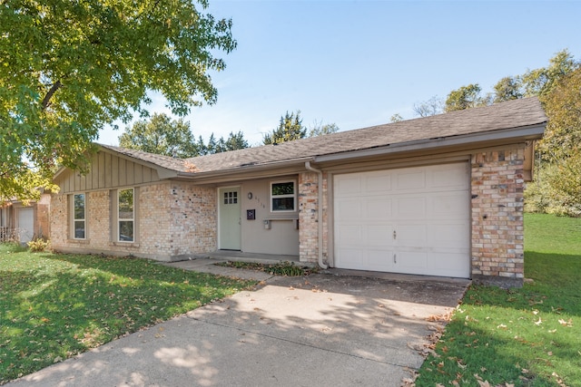 single story home with a front yard and a garage