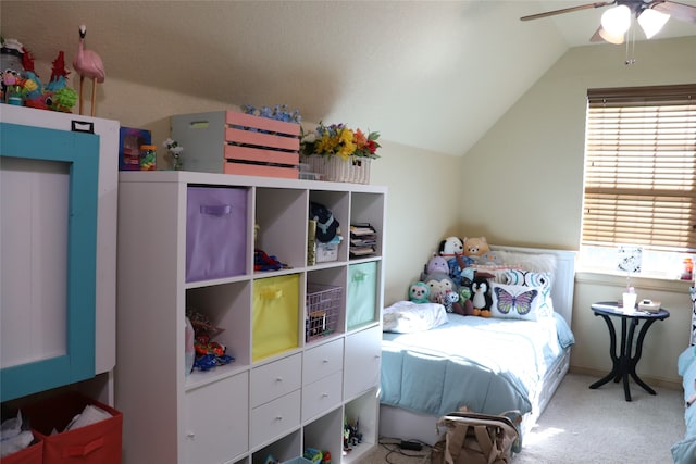 bedroom featuring carpet, ceiling fan, and lofted ceiling