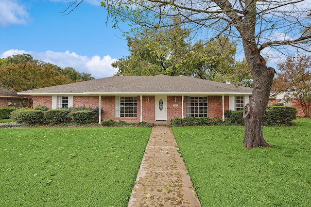 ranch-style home with a front yard