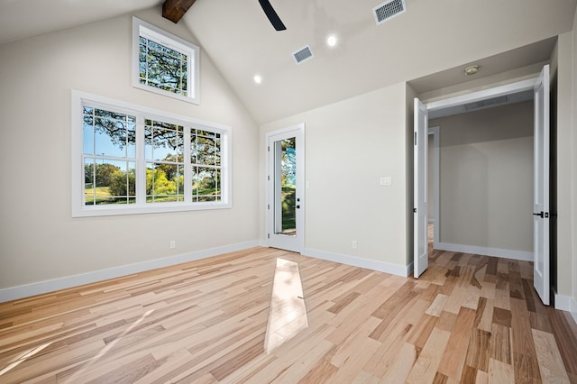 unfurnished bedroom featuring beamed ceiling, light wood-type flooring, high vaulted ceiling, and ceiling fan