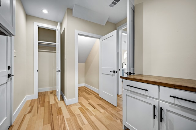 hallway featuring light wood-type flooring