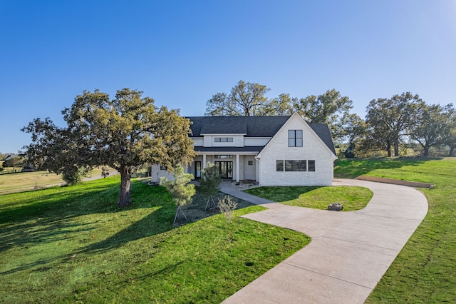 view of front of house with a front lawn