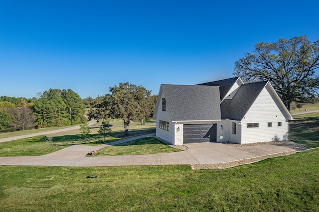 view of side of property featuring a yard