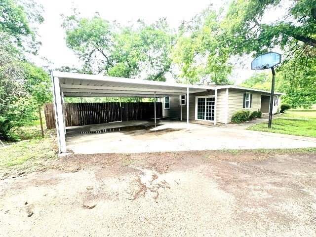 view of front of home with a carport