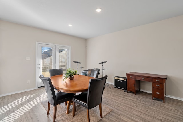 dining room featuring light hardwood / wood-style flooring