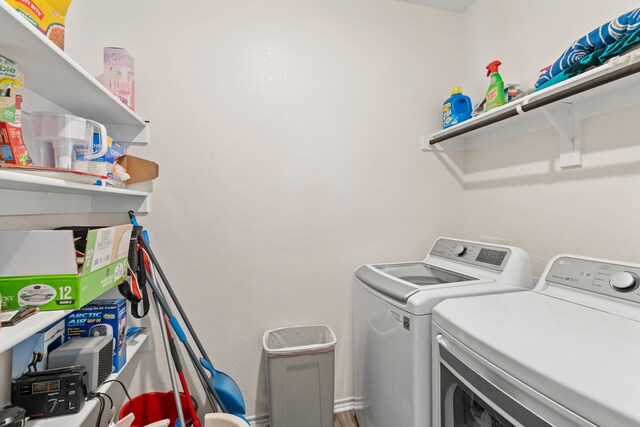 laundry room featuring laundry area and washer and clothes dryer