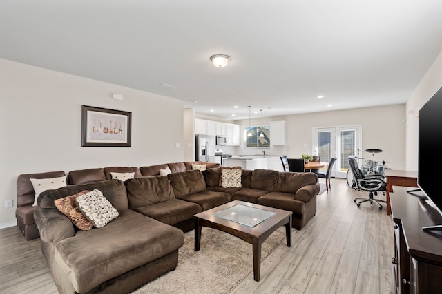 living room featuring light hardwood / wood-style floors