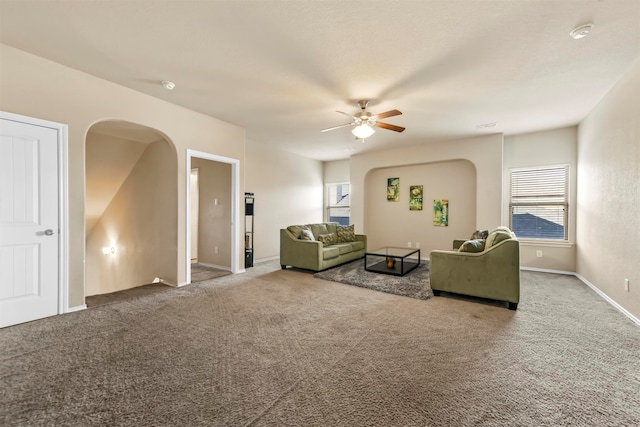 living room with carpet floors and ceiling fan