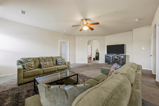 living room with carpet floors and ceiling fan