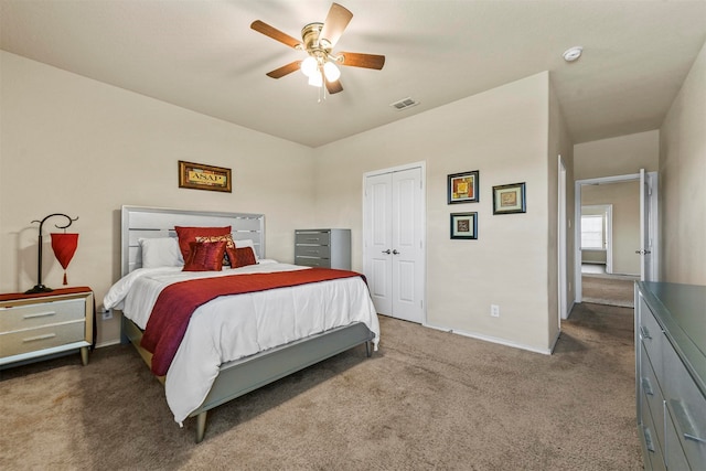 bedroom with ceiling fan and carpet floors