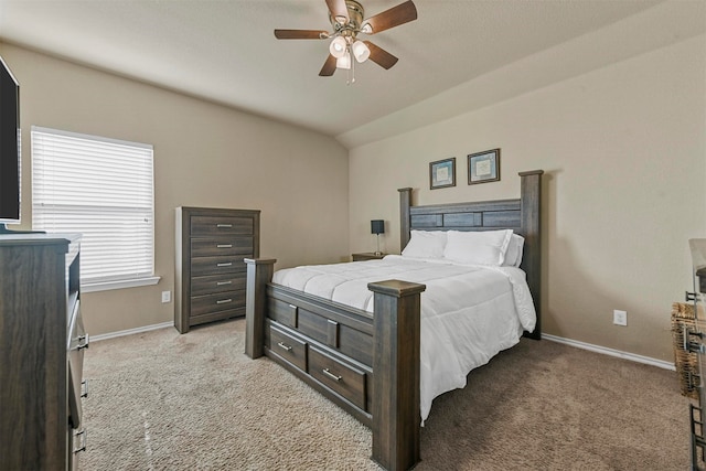 bedroom featuring ceiling fan, light colored carpet, and lofted ceiling