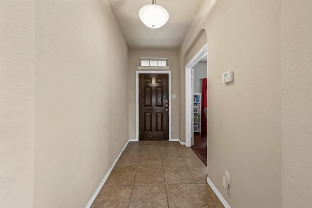 entryway featuring tile patterned flooring