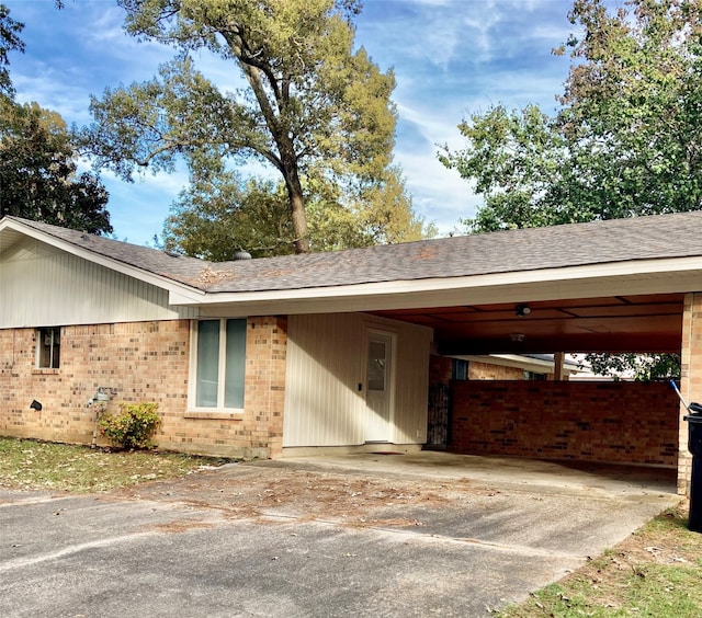 view of front facade with a carport