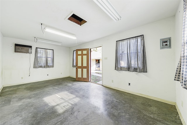 spare room featuring a wall unit AC